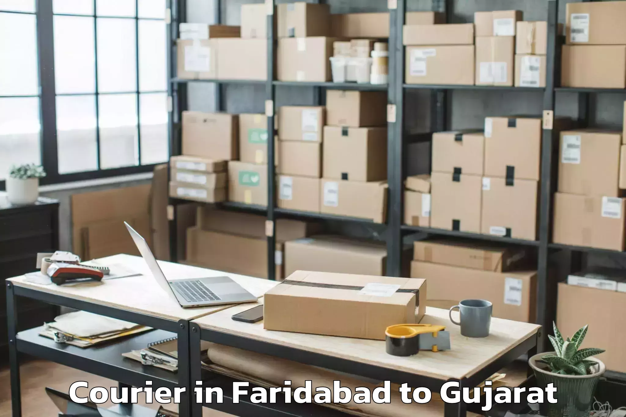 Get Faridabad to Wankaner Courier